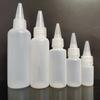 Botellas de pigmento en stock 10 ml 20 ml 30 100 ml Botella de plástico transparente con punta