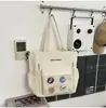 Nuevas mochilas para hombre y mujer para estudiantes de secundaria y preparatoria, gran capacidad, adecuadas para tutorías o como bolso de hombro, disponibles en dos estilos