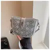 Nova Bolsa de Mão com Corrente Estilosa Versátil de Verão Design de Nicho Bolsa de Ombro Único Sob o Braço Toque de Alto Padrão Bolsa Sela Inclinada