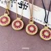 Collar Colgante de Girasol de Lujo Versátil de Gama Alta al por Mayor con Diamantes de Puntos Rojos y Verdes de la Joyería