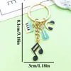 Venta Caliente Transfronteriza Cinta de Música Antigua Saxofón Órgano Llavero Diseño Creativo Sentido Colgante de Bolsa Pequeños Accesorios