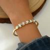 Pulsera de Moda Retorcida con Incrustaciones de Cristal de Vidrio de Venta Caliente Europea y Americana, Joyería de Pulsera Elegante Exquisita de Nicho de Lujo Ligero Japonés y Coreano