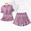 Conjunto de pijama de dos piezas de manga corta con cuello en V, estampado de contraste de color y almohadilla para el pecho.