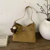 Bolso tote de nicho versátil y minimalista para mujer, nuevo modelo de invierno 2025, textura de alta calidad, adecuado para el trabajo y los desplazamientos, bolso de hombro cruzado