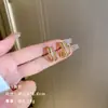 Exquisitos pendientes largos cortos con borlas incrustados de perlas y diamantes para mujer diseño de nicho de lujo ligero pendientes de lazo amor