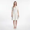 Atacado de Fábrica E-commerce Transfronteiriço Primavera Verão Elegante Senhora Branco Decote V Manga Curta Linha A Pulôver Cintura Marcada Vestido de Tricô
