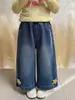 Nuevos Jeans de Cinco Puntas con Cintura Curva de Comercio Exterior para Niños Otoño 2026 Versión Coreana Pantalones de Pierna Ancha Escolares para Niñas Ropa Infantil de Moda