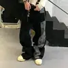 Jeans largos de pierna recta holgados estilo retro americano con patchwork negro y gris y estampado integral de estrellas, estilo callejero para hombre