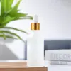 Botella gotero de vidrio esmerilado de 30 ml en stock para dispensar líquidos, botella pequeña de vidrio para productos de cuidado de la piel y muestras de cosméticos