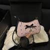 Bolsa de Ombro Único com Laço Doce Textura Versátil para o Dia a Dia Mulher 2025 Nova Moda de Nicho Bolsa Baguete de Mão