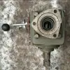 Tractor pequeño de cuatro ruedas de un solo eje modificado a tracción trasera, salida trasera modificada, caja de cambios de transmisión del eje de transmisión de motoazada rotativa
