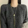 Collar de Borla de Zirconia Saturno Tirable y Ajustable para Mujer Accesorios de Cadena Larga para Suéter de Lujo Accesible Japonés y Coreano Gama Alta de Nicho
