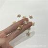 Nuevos accesorios de cobre con microincrustaciones de circonita y oro kc con protección de color, colgante de copo de nieve de 12 mm, accesorios navideños, material de accesorios de joyería DIY