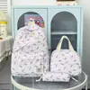 Nova Bolsa de Ombro Duplo com Estampa de Flores Borboleta Transfronteiriça Feminina Estudante Bolsa Escolar Mochila Campus Fresca Doce Conjunto de Três Peças