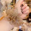 Nuevo Estilo Platino Flor de Estrella de Verano Goma para el Cabello de Douyin, Tela de Lujo Ligero Girasol Accesorio para el Cabello Diadema