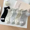 Fábrica de Zhuji Venta al por mayor Calcetines para mujer con lunares y cachorro lindo, Versión de calidad y cómoda, Calcetines para mujer estilo universitario simples y cortos
