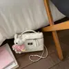 Bolso Pequeño Súper Popular para Mujer 2026 Nuevo Diseño de Nicho Bolso Cruzado Acolchado con Cadena Bolso de Mano Cuadrado Pequeño de Venta Caliente Transfronterizo