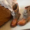 Diseño de nicho estilo vintage 2026 otoño e invierno nueva moda botas vaqueras para mujer con lazo de lona de tubo corto botas de montar