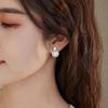¡Huevo de paloma socialité! Diseño moderno luz natural fuerte 6A perla de agua dulce aguja de plata S925 aretes de nicho de lujo ligero
