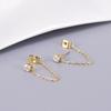Pendientes de cadena sencilla con colgante trasero de oro de 18 quilates y acero de titanio E75 para hombre y mujer, estilo retro sencillo de puerto callejero con pequeños diamantes.