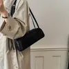 Diseño de nicho moderno simple bolso de un solo hombro estilo coreano ins uso diario elegante moderno casual bolso de axila de un solo hombro