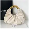 2026 Nova Moda Feminina Bolsa Concha Bolsa de Mão Transversal de Ombro Bolsa Feminina Simples Nuvem Plissada Bolsa Feminina de Comércio Exterior