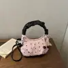 Bolso Adorable y Fresco con Lazo para Mujer 2026 Nuevo Bolso de Hombro Plegado de Moda Bolso Cruzado de Alto Valor