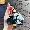 Chaveiro Gravador de Vídeo Desenho Animado Criativo Brinquedo Luminoso de Projeção Desenho Animado Pingente de Mochila Infantil Presente