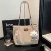 Bolsos de nicho versátiles y elegantes: Bolsos tote de gran capacidad para el día a día 2026, bolsos casuales para mujer de alta gama y a la moda