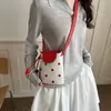 Bolso pequeño fresco y dulce al por mayor para mujer, nuevo bolso de hombro con bloqueo de color de lunares para el verano 2026, bolso cruzado para teléfono