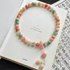 Flor Rara Color Piel Jade-like Material Viejo Bodhi Anillo de Mano Dedo Anular Semilla de Bodhi Suave Wenwan Estudiante Alivio del Estrés Pulsera de Cuentas de Oración Femenina