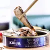 Arenque occidental ahumado importado de Letonia, empapado en aceite, de sabor fuerte, enlatado, pescado enlatado listo para comer con vino y verduras