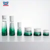 Botella de Vidrio con Bomba de Prensa de Color Pulverizado Xinmei Set de Botellas de Vidrio Cosmético Botella Dispensadora de Loción Materiales de Empaque Personalizados