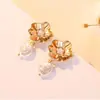 S925 Sterling Silver Ear Needle Retro Flower Pearl Brincos Estilo Coreano Elegante Moda Fresh Brincos Brincos