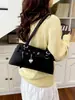 Bolso de axila retro de alta gama para mujer, nuevo bolso de mano de moda tendencia 2026, bolso de hombro de gran capacidad para el día a día, bolso baguette