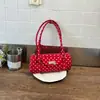 Bolso de moda transfronterizo dulce tipo baguette con diseño de lunares de nicho, bolso de axila, bolso de hombro de bloqueo de color de comercio exterior de alta gama y moderno