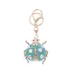Chaveiro Criativo de Joaninha Sete Estrelas com Diamantes Chaveiro de Inseto Boutique Presente Personalizado de Metal Pingente para Mochila Atacado