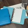 Venta al por mayor en stock de cuadernos de hojas sueltas tamaño A6, blocs de notas, cuadernos de tarjetas perforadas, cuadernos de hojas sueltas, cuadernos simples con encuadernación de cuero con impresión de logotipo