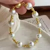 Nuevo Conjunto de Collar y Pulsera de Perlas Artificiales de Cristal Redondo Blanco Frío Resaltado Retro Chino Familia Shi