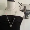 Novo Colar Estilo Chinês Longo 2025 Novo Pingente de Coração Empilhado Acessórios de Nicho de Alta Qualidade para Mulheres