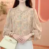 Producto estrella de dropshipping para transmisión en vivo 2026 verano, camisa de mujer estilo coreano con estampado de encaje, holgada y adelgazante, top de manga tres cuartos