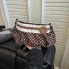Bolso bandolera de lunares y bloques de color fresco y sencillo, nuevo estilo étnico 2026, bolso de hombro de nube plisado retro único
