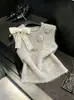 Colete Tricot Feminino Gola Redonda Floral 3D Estilo Outono 2026 Peça de Sobrepor Regata Cinza Cor Sólida