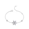 Pulsera Navideña de Copo de Nieve Pulsera de Lujo Ligero Japonesa y Coreana Engastada a Mano con Cristal Puntiagudo Azul Zirconio Blanco Plata Esterlina Elegante Mano Blanco Nicho