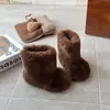 Botas de Neve Infantis 2025 Inverno Novas Botas de Algodão Quentes Sapatos Peludos para Meninas Botas de Cano Médio com Forro de Lã Quente Tendência