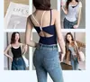 Camisola sexy de dos piezas falsas con lazo y diseño calado, copas de sujetador incorporadas, adecuada para primavera y verano, se puede usar como top