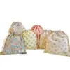 Pequeña bolsa de almacenamiento de algodón popelina floral con cordón bolsa de tela venta al por mayor de fábrica