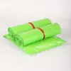 Bolsa de embalaje de plástico gruesa nueva color verde fruta bolsa de embalaje logístico impermeable borde a prueba de explosiones resistente al desgarro bolsa autoadhesiva puede ser al por mayor