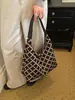 Colección nueva 2026 transfronteriza: Bolso de hombro de alta calidad para mujer con patrón de diamantes texturizado, moderno y versátil, con gran capacidad, perfecto para ir al trabajo.