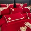 Lujoso juego de cuatro piezas de color rojo brillante para boda, algodón puro con bordado de dragón y fénix, sábana bajera y funda de edredón, ropa de cama para boda